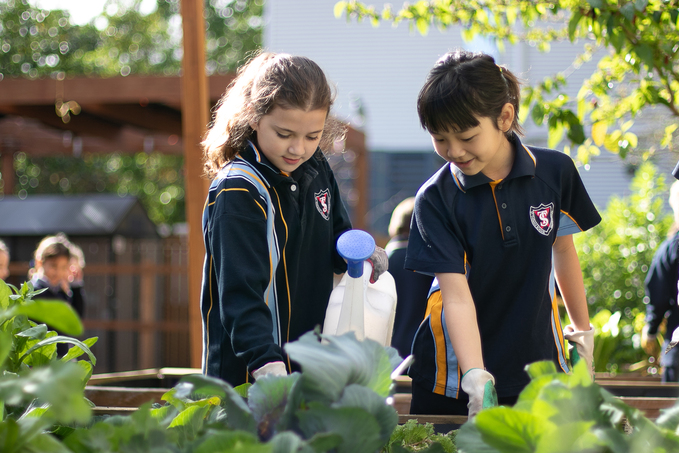 girls watering.jpg